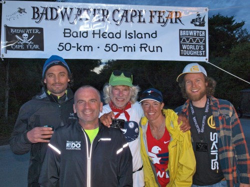BADWATER CAPE FEAR Finish Line. From left: Bradford Lombardi, Time Finholm, Jim Schroe de r, Je nni Holle nbeck and Ke ith Hanson. Photo by Chris Kostman, Adve nture CORPS, Inc.